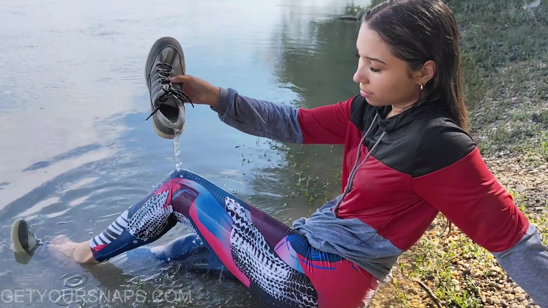 Ellie gets wet  in the river - frame at 7m31s